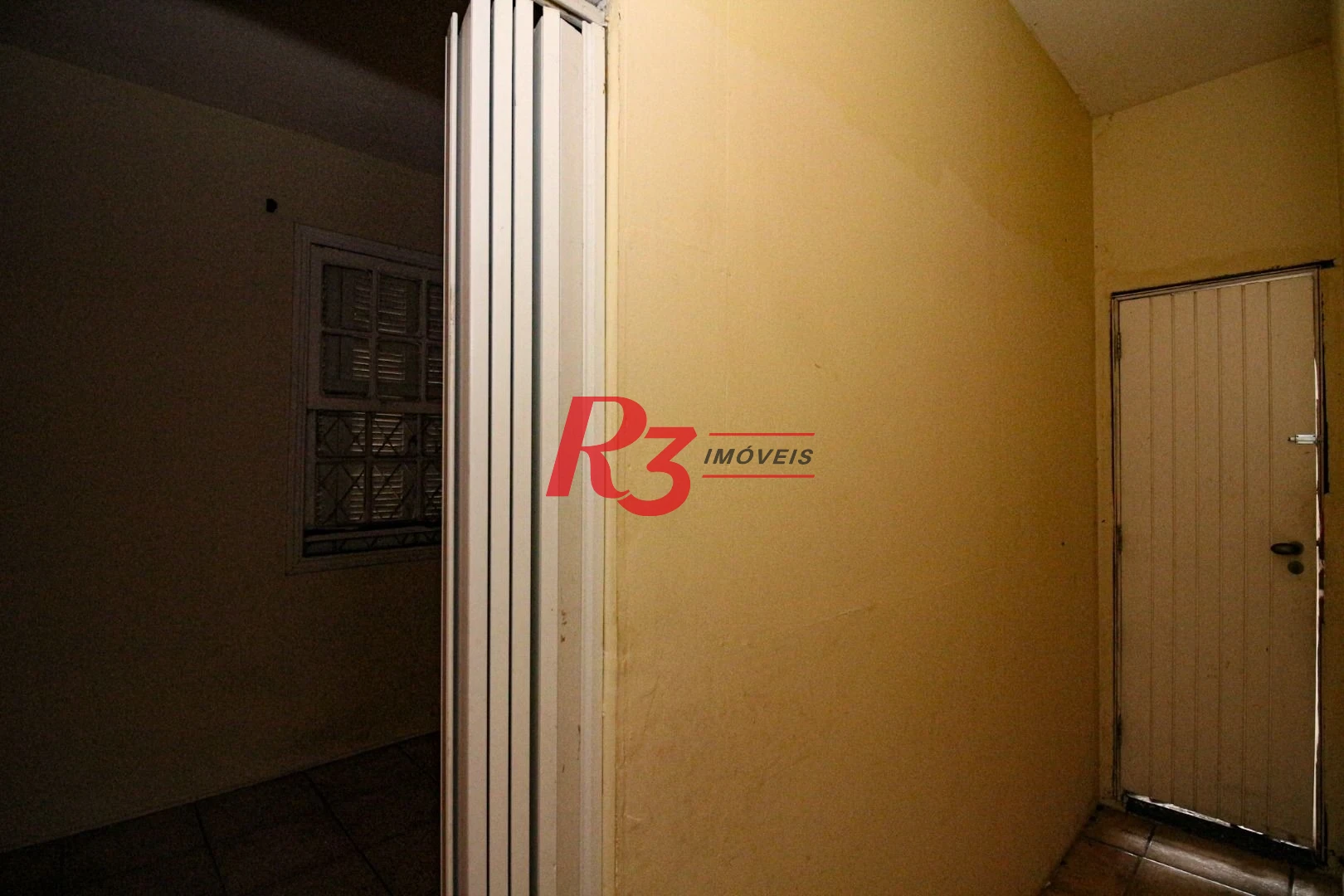 Casa à venda, 110 m² por R$ 672.000,00 - Macuco - Santos/SP