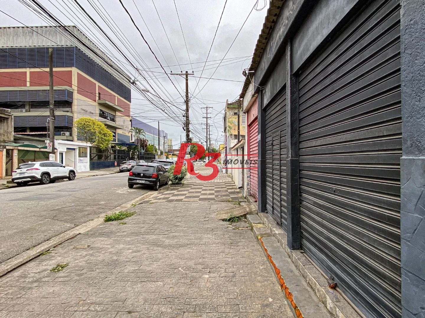 Casa à venda, 110 m² por R$ 672.000,00 - Macuco - Santos/SP