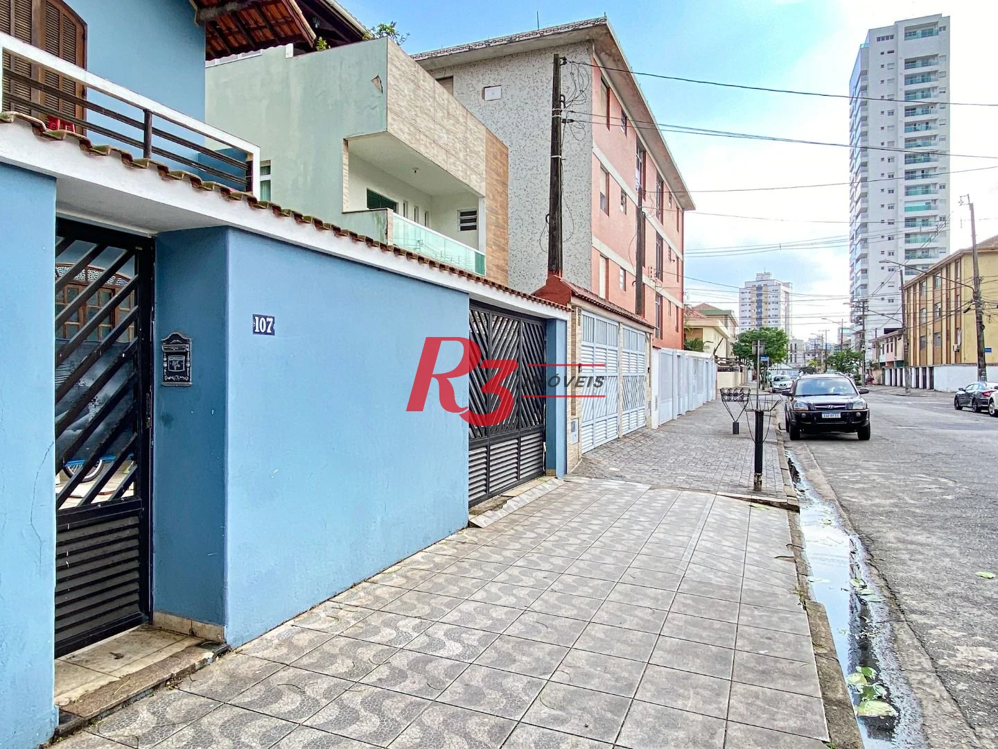 Sobrado com 3 dormitórios à venda, 360 m² por R$ 1.000.000,00 - Estuário - Santos/SP