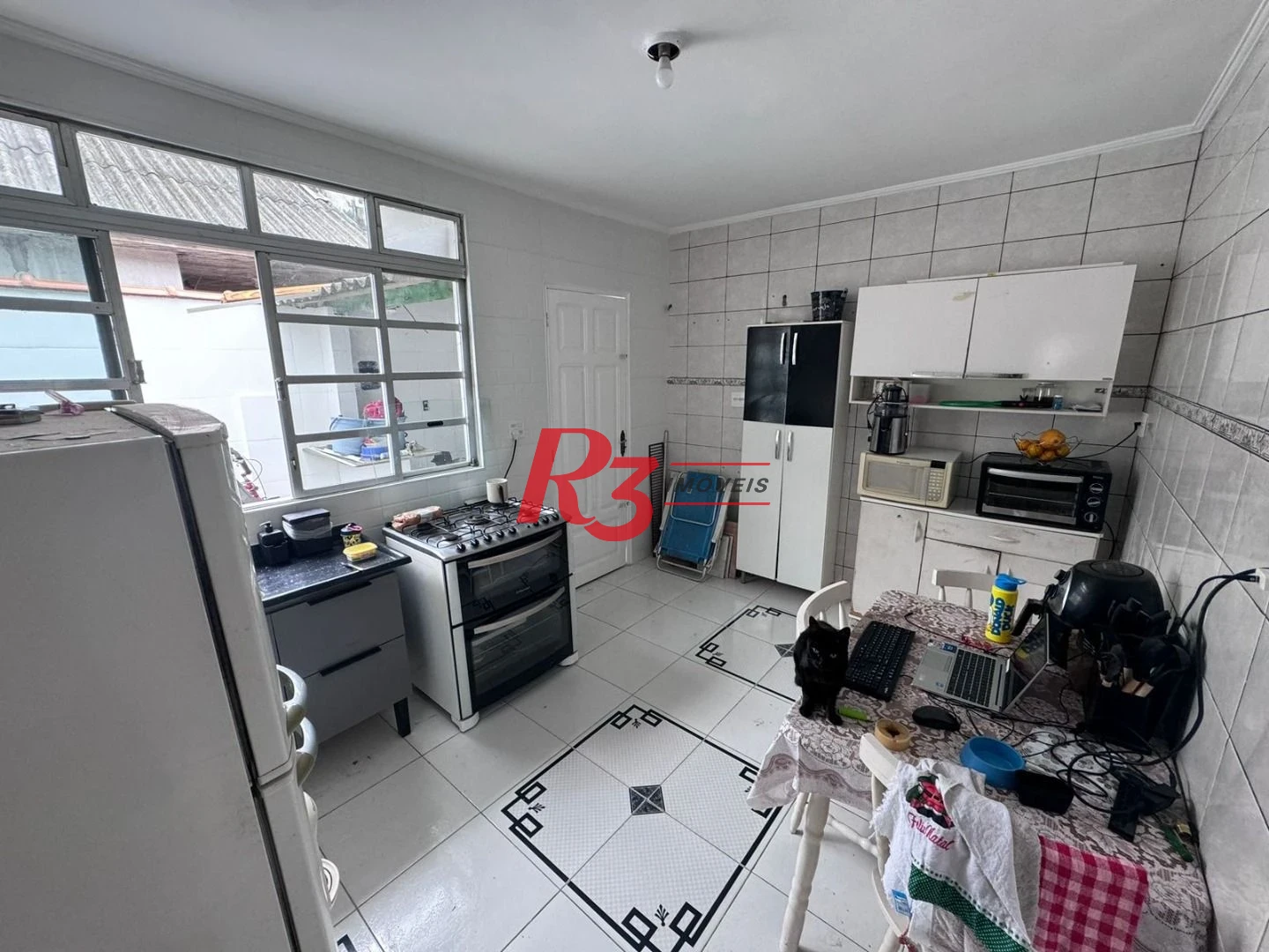 Casa com 2 dormitórios à venda, 60 m² por R$ 400.000,00 - Macuco - Santos/SP
