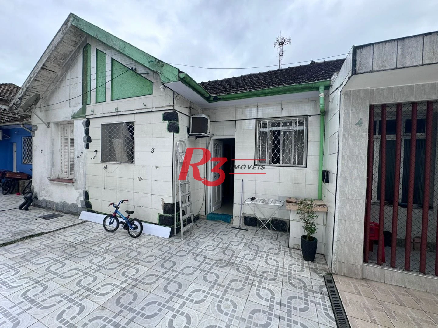 Casa com 2 dormitórios à venda, 60 m² por R$ 400.000,00 - Macuco - Santos/SP