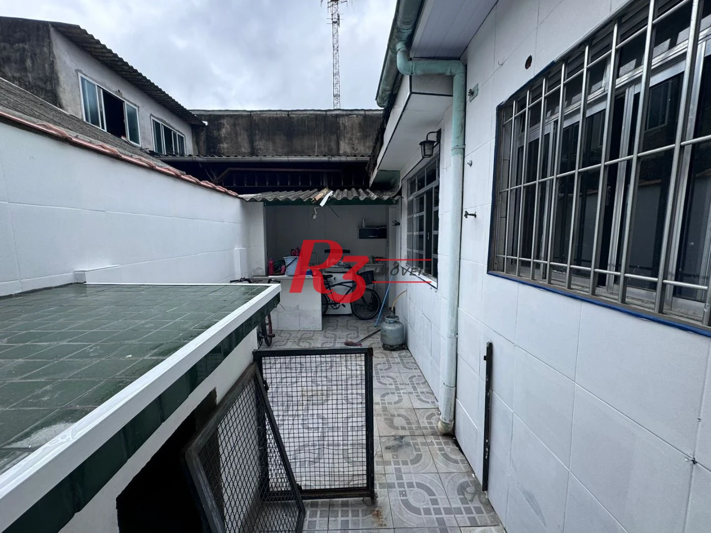 Casa com 2 dormitórios à venda, 60 m² por R$ 400.000,00 - Macuco - Santos/SP