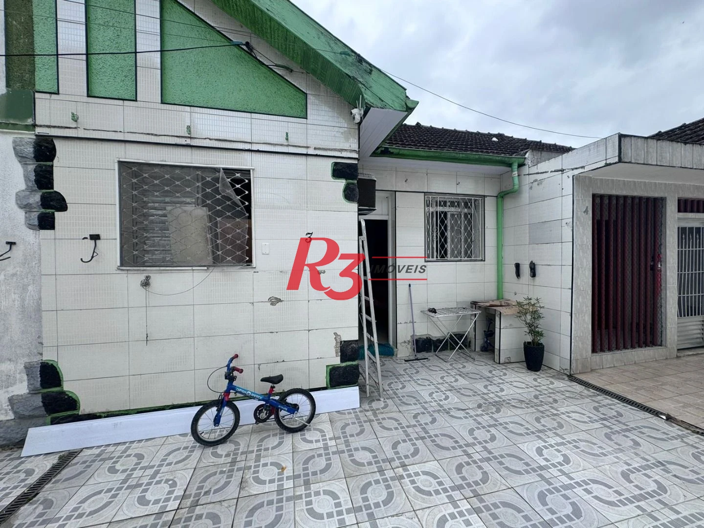Casa com 2 dormitórios à venda, 60 m² por R$ 400.000,00 - Macuco - Santos/SP