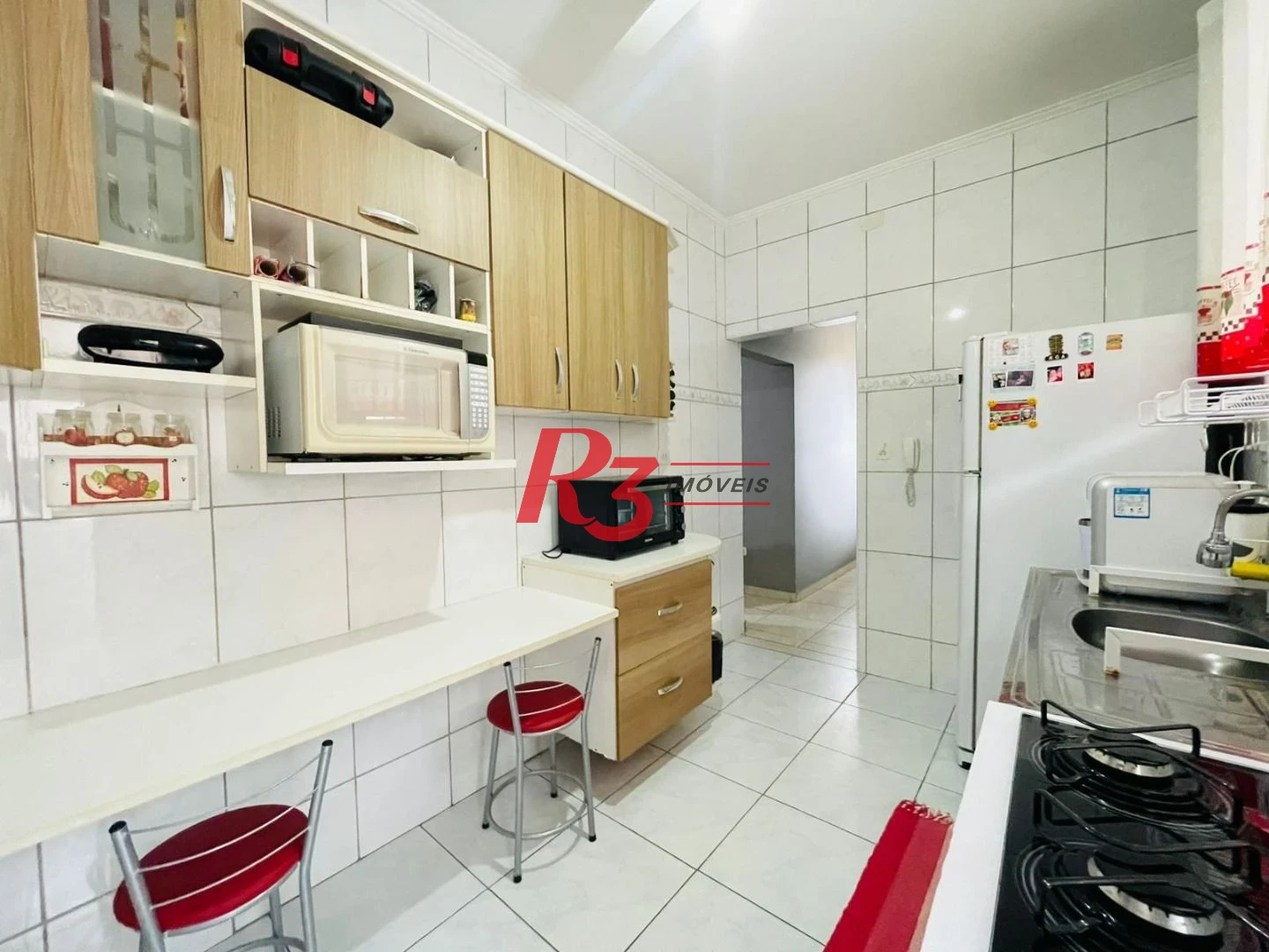 Apartamento com 2 dormitórios à venda, 62 m² por R$ 490.000,00 - Gonzaga - Santos/SP