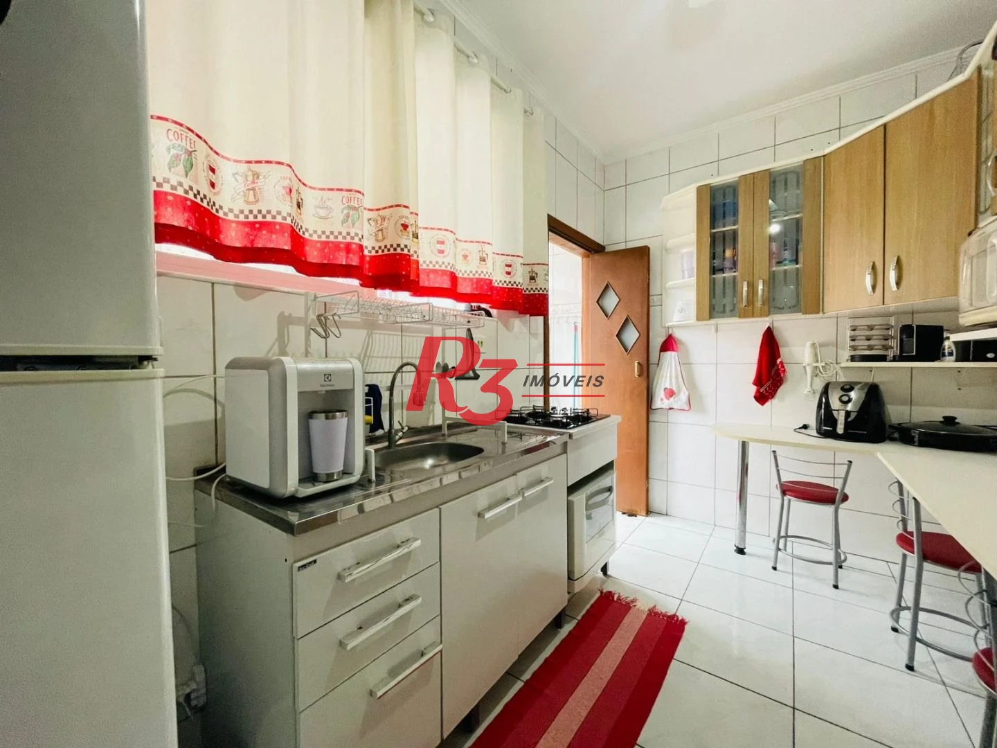 Apartamento com 2 dormitórios à venda, 62 m² por R$ 490.000,00 - Gonzaga - Santos/SP