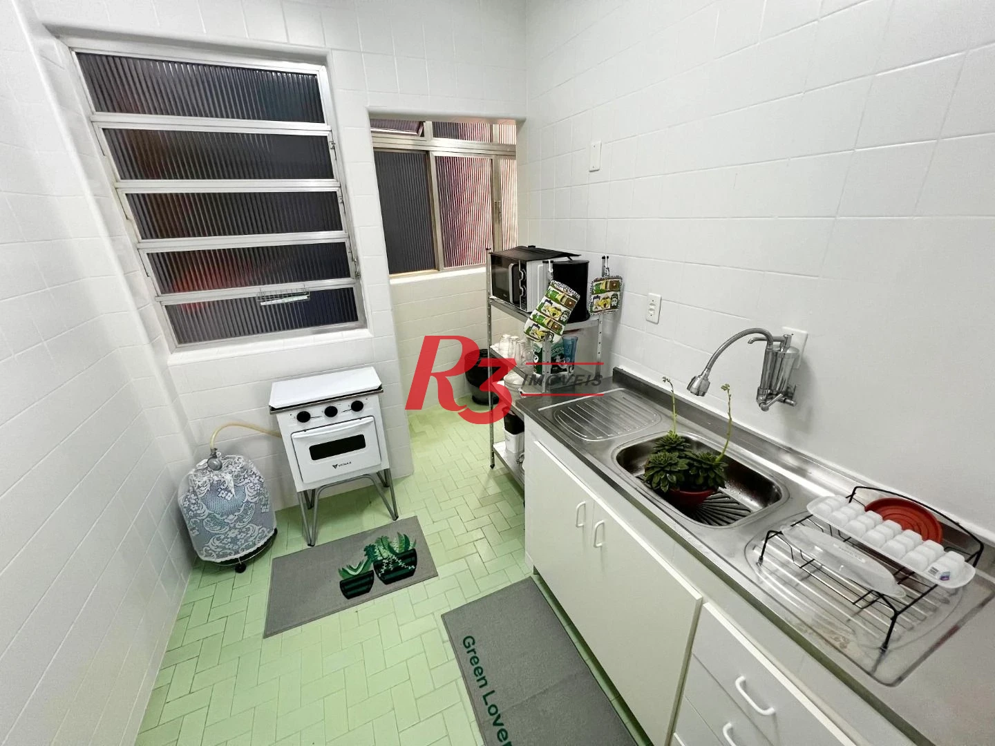 Apartamento com 3 dormitórios à venda, 90 m² por R$ 620.000,00 - Gonzaga - Santos/SP