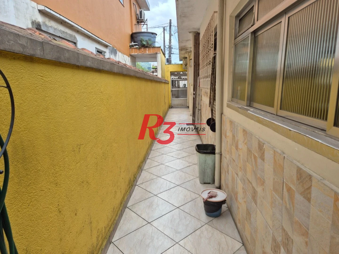 Casa com 3 dormitórios à venda, 196 m² por R$ 430.000,00 - Santa Maria - Santos/SP