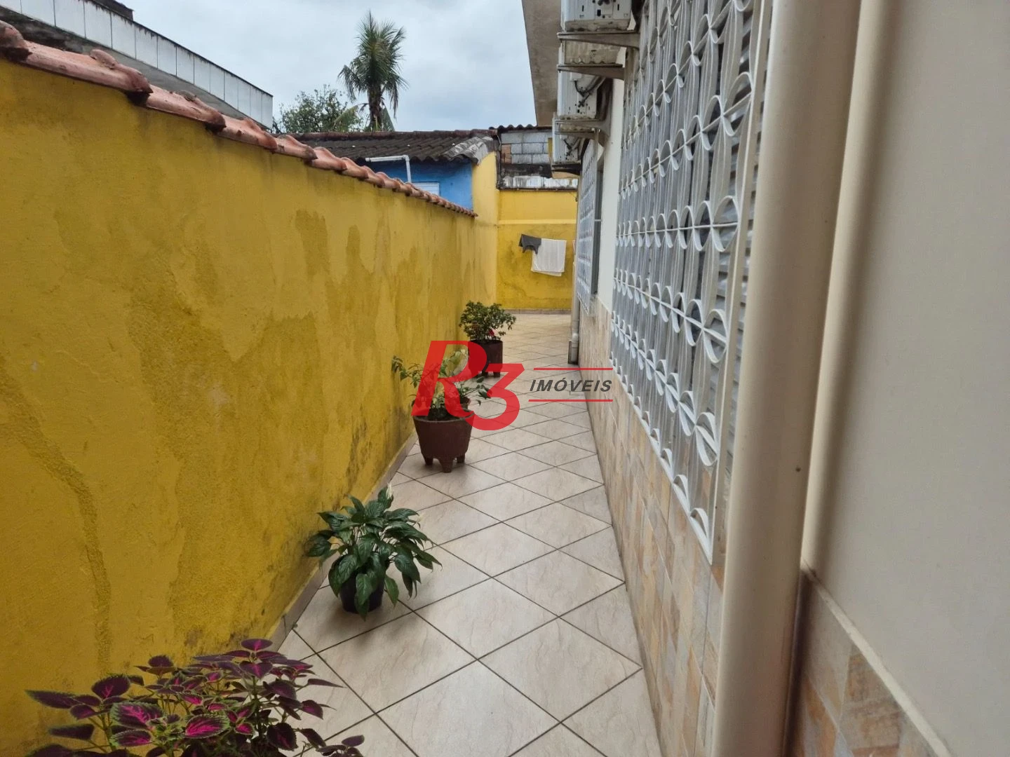 Casa com 3 dormitórios à venda, 196 m² por R$ 430.000,00 - Santa Maria - Santos/SP