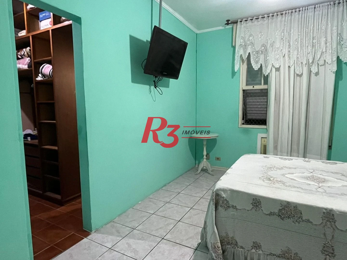 Apartamento com 3 dormitórios à venda, 133 m² por R$ 690.000,00 - Gonzaga - Santos/SP