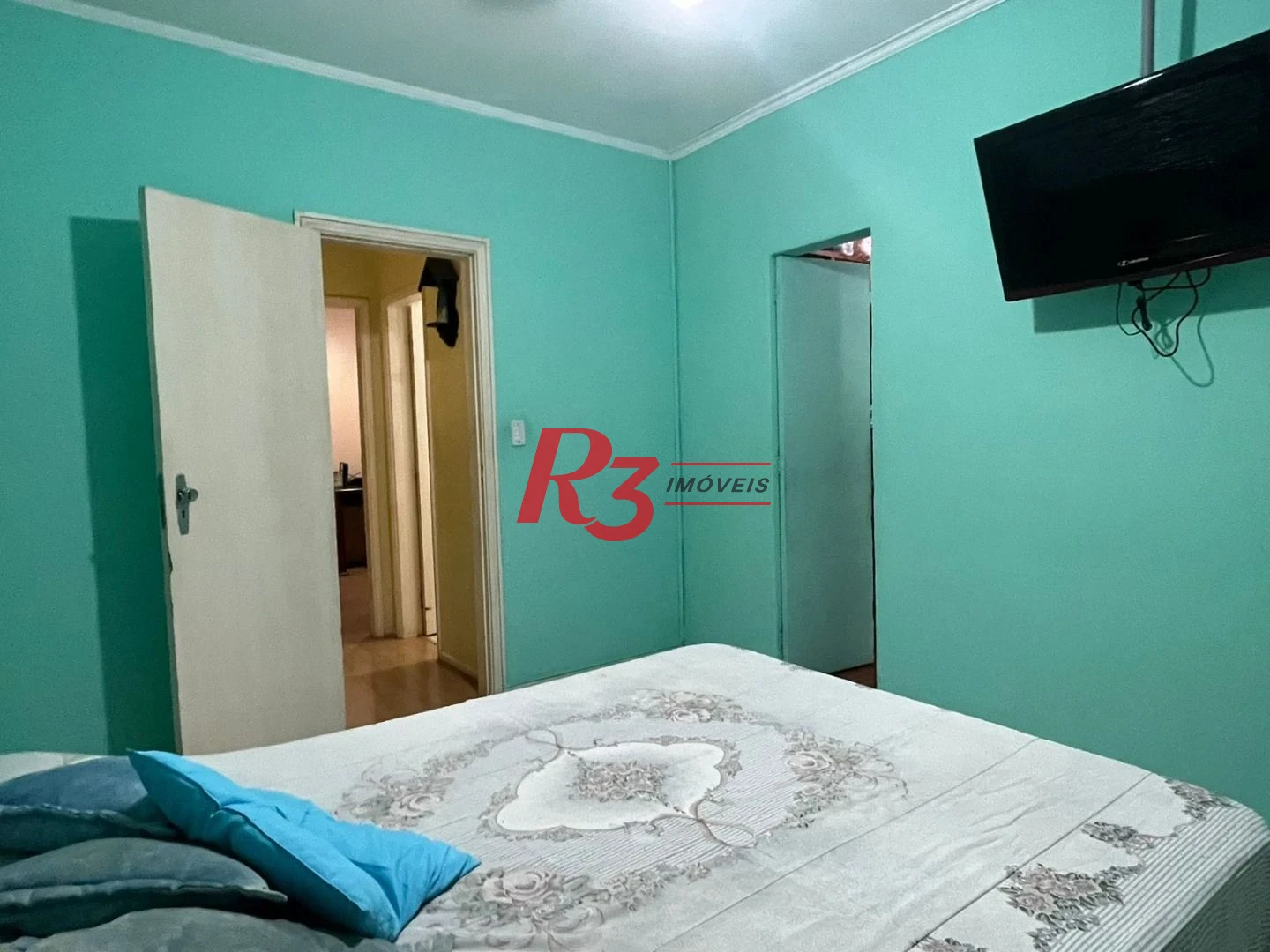 Apartamento com 3 dormitórios à venda, 133 m² por R$ 690.000,00 - Gonzaga - Santos/SP