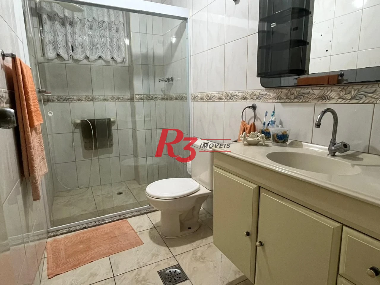 Apartamento com 3 dormitórios à venda, 133 m² por R$ 690.000,00 - Gonzaga - Santos/SP
