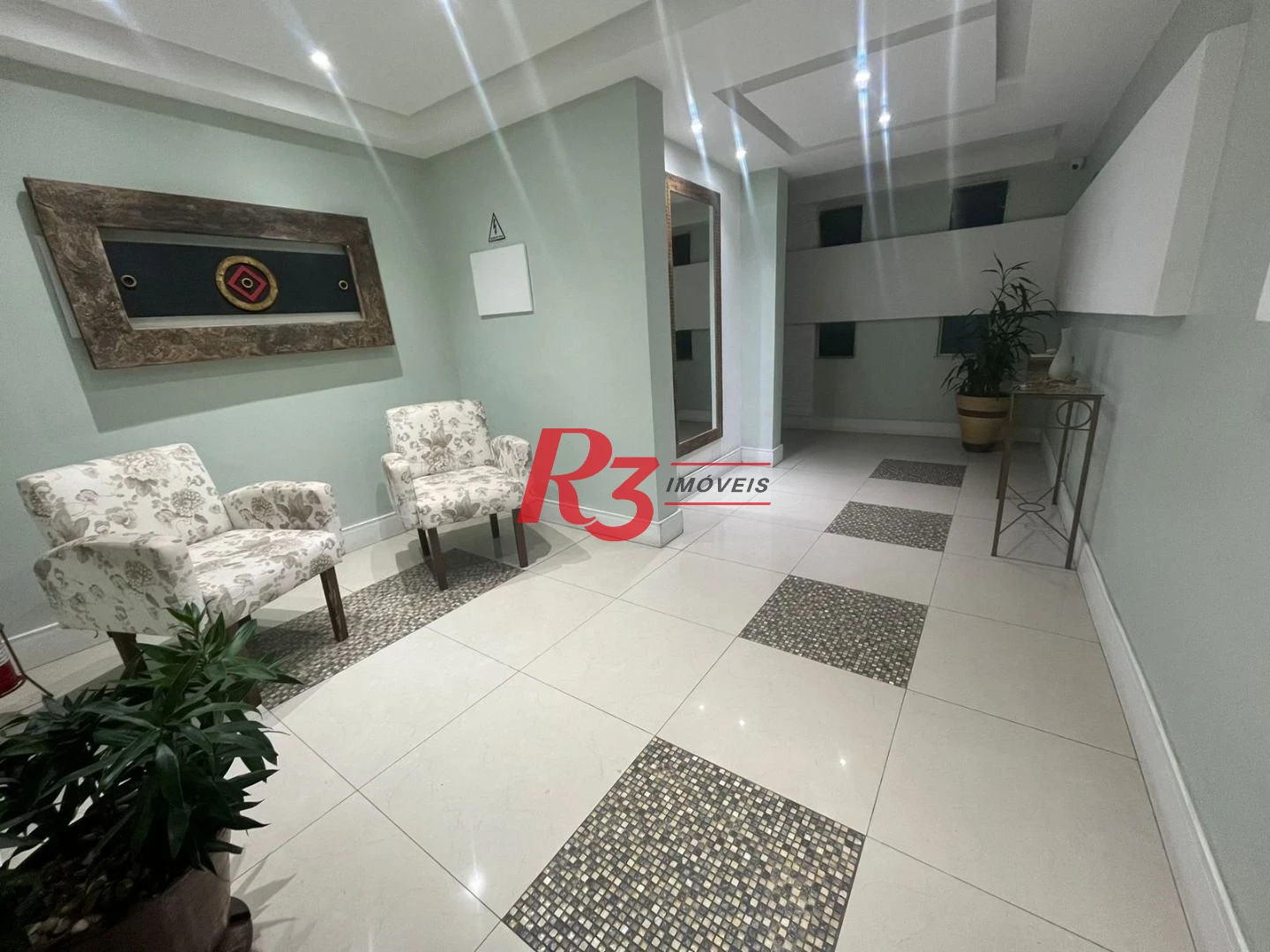 Apartamento com 3 dormitórios à venda, 133 m² por R$ 690.000,00 - Gonzaga - Santos/SP