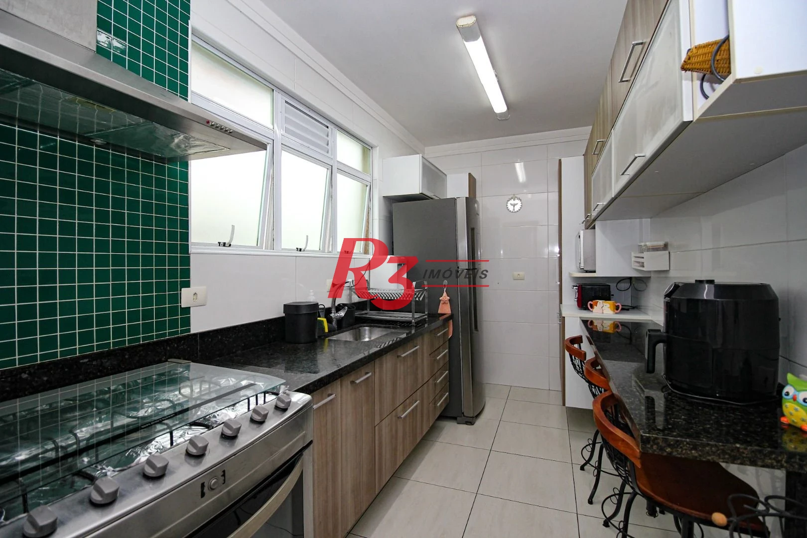 Casa à venda, 136 m² por R$ 1.150.000,00 - Gonzaga - Santos/SP