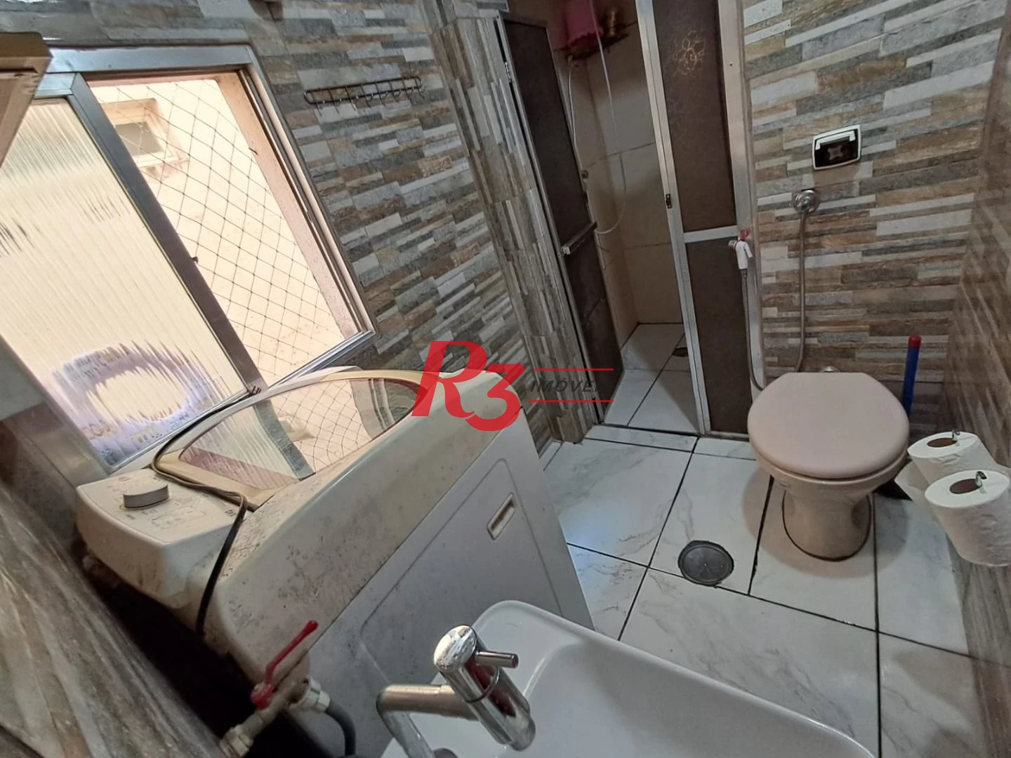 Kitnet com 1 dormitório à venda, 50 m² por R$ 296.000,00 - Gonzaga - Santos/SP