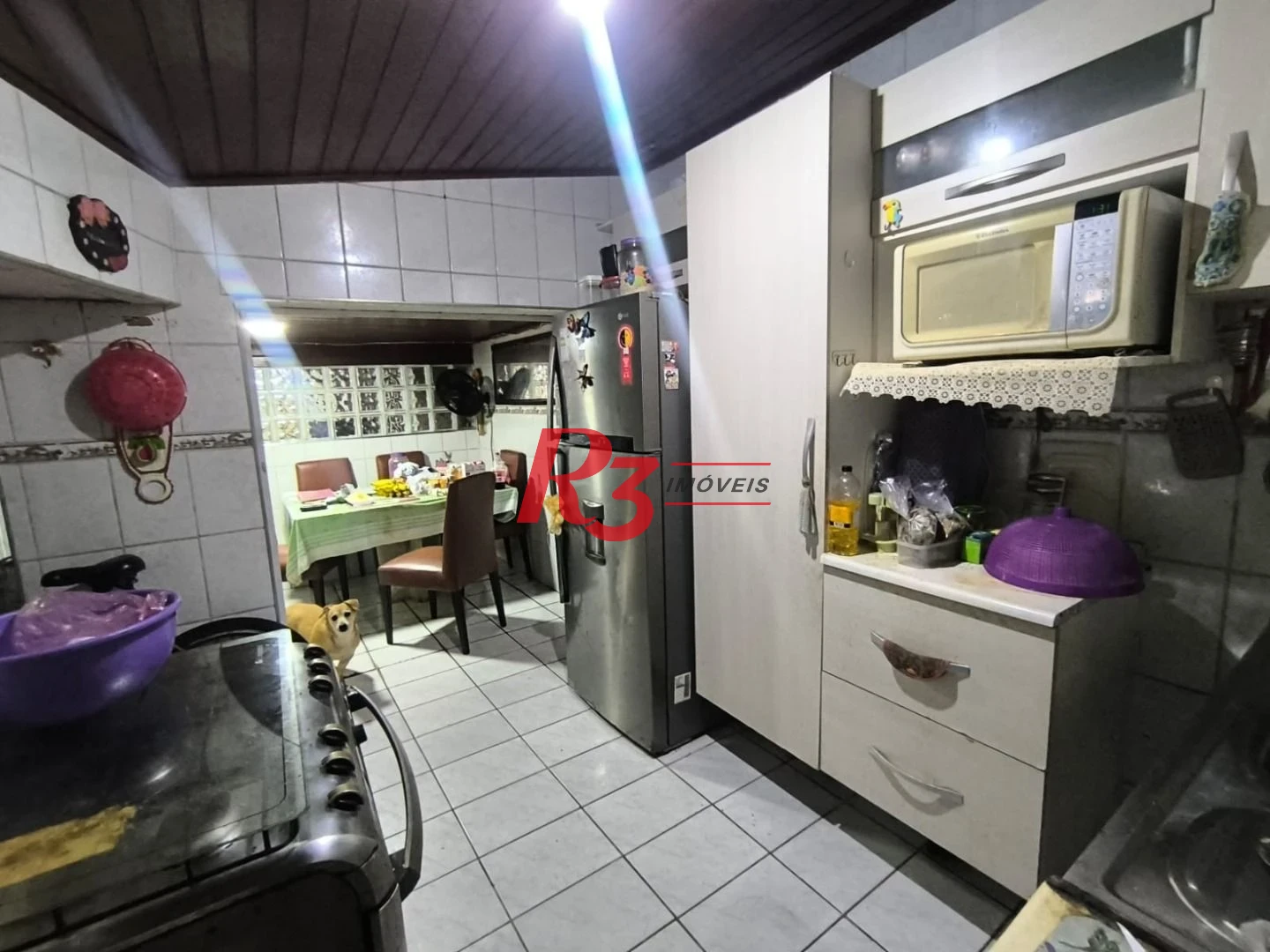 Sobrado com 4 dormitórios à venda, 130 m² por R$ 586.000,00 - Campo Grande - Santos/SP