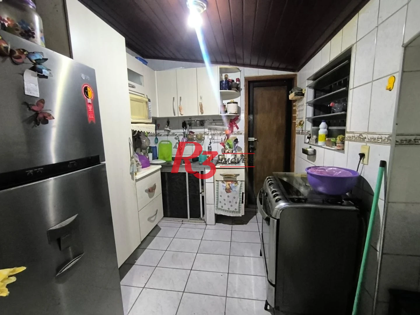 Sobrado com 4 dormitórios à venda, 130 m² por R$ 586.000,00 - Campo Grande - Santos/SP