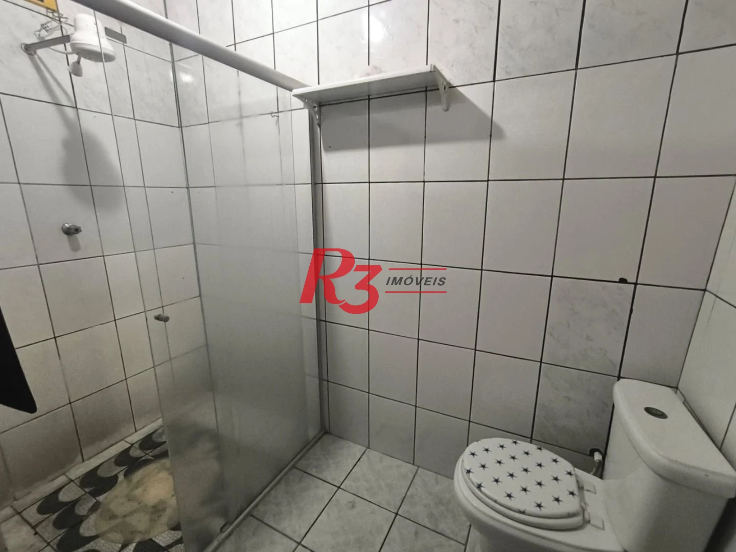 Sobrado com 4 dormitórios à venda, 130 m² por R$ 586.000,00 - Campo Grande - Santos/SP