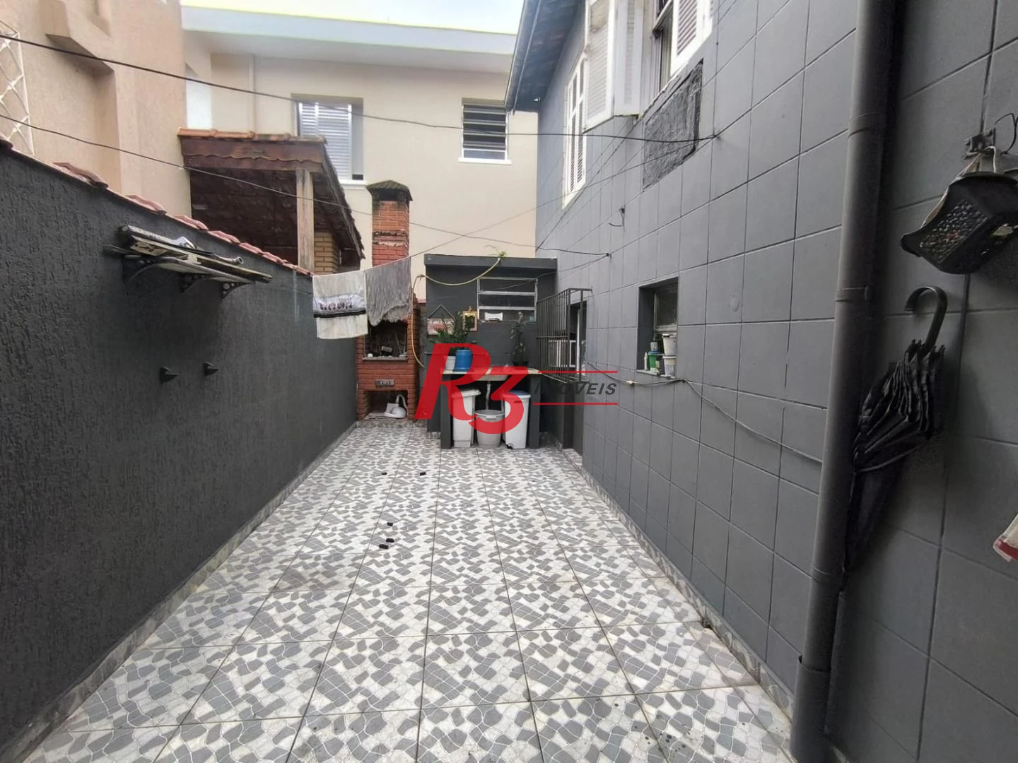 Sobrado com 4 dormitórios à venda, 130 m² por R$ 586.000,00 - Campo Grande - Santos/SP