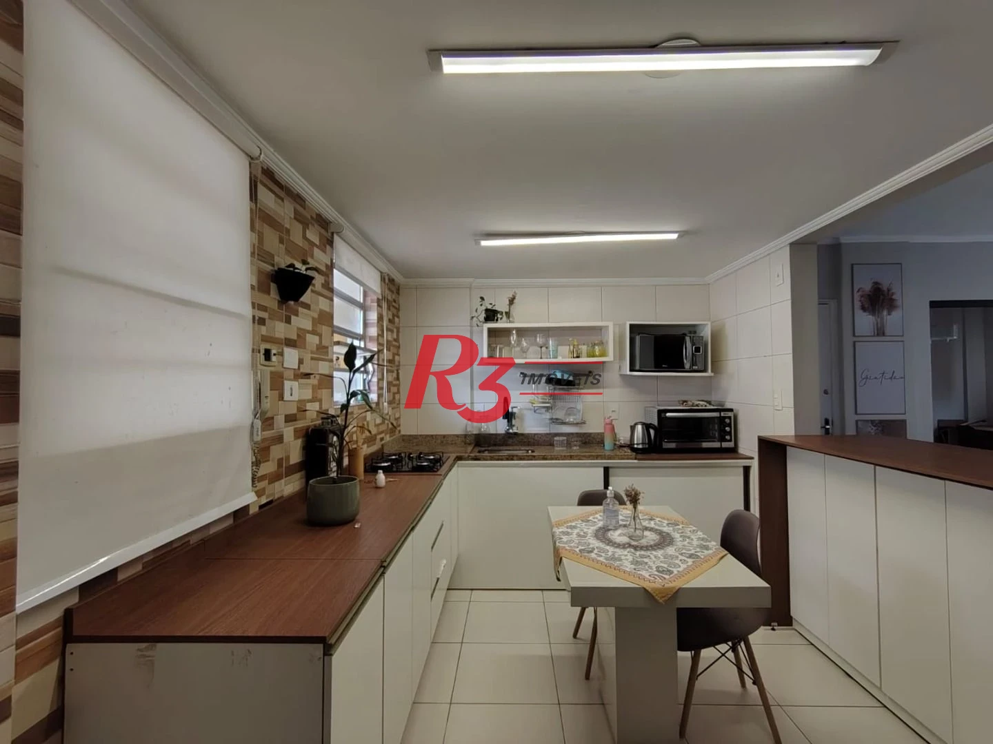 Apartamento com 2 dormitórios à venda, 94 m² por R$ 630.000,00 - Gonzaga - Santos/SP