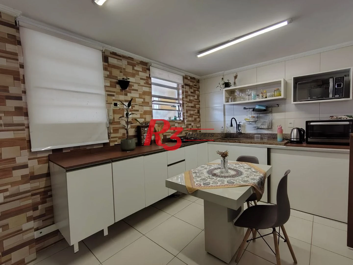 Apartamento com 2 dormitórios à venda, 94 m² por R$ 630.000,00 - Gonzaga - Santos/SP