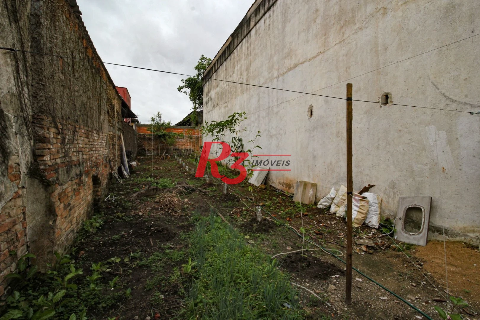 Casa com 2 dormitórios à venda, 120 m² por R$ 1.500.000,00 - Macuco - Santos/SP