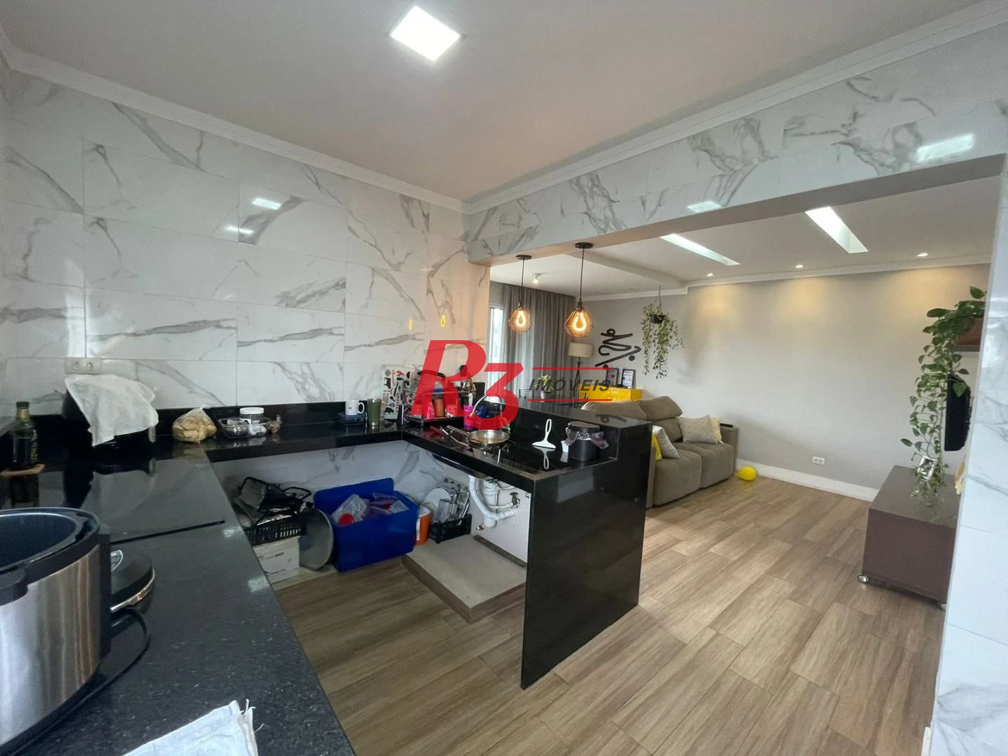 Casa com 3 dormitórios à venda, 117 m² por R$ 950.000,00 - Estuário - Santos/SP