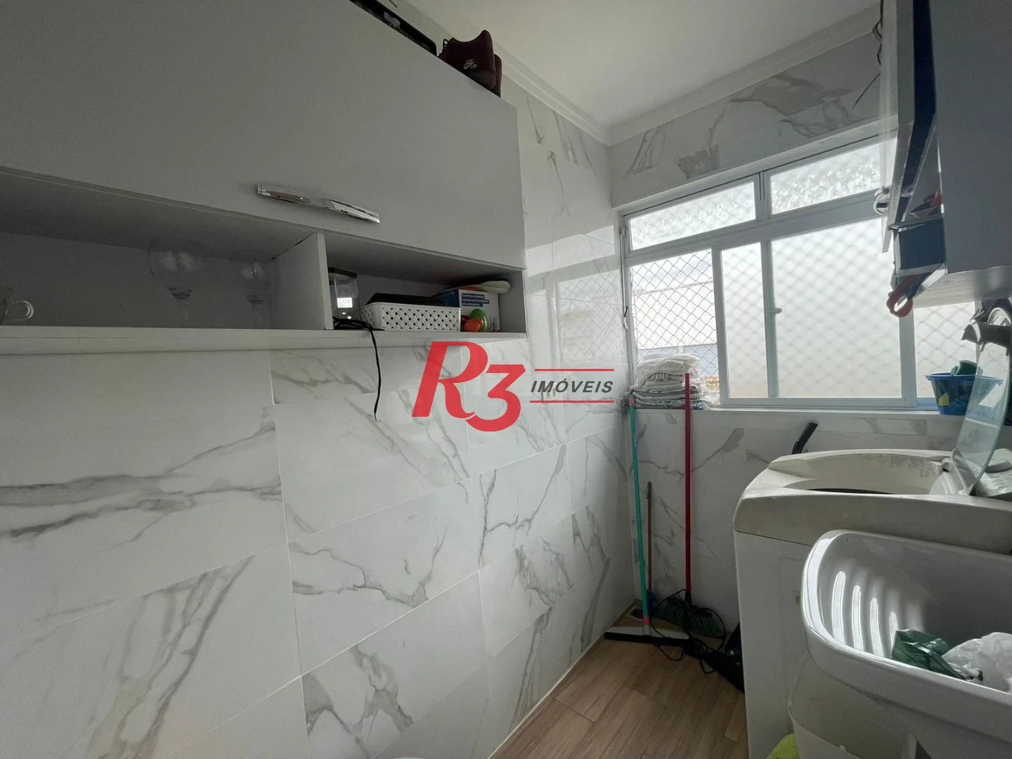 Casa com 3 dormitórios à venda, 117 m² por R$ 950.000,00 - Estuário - Santos/SP