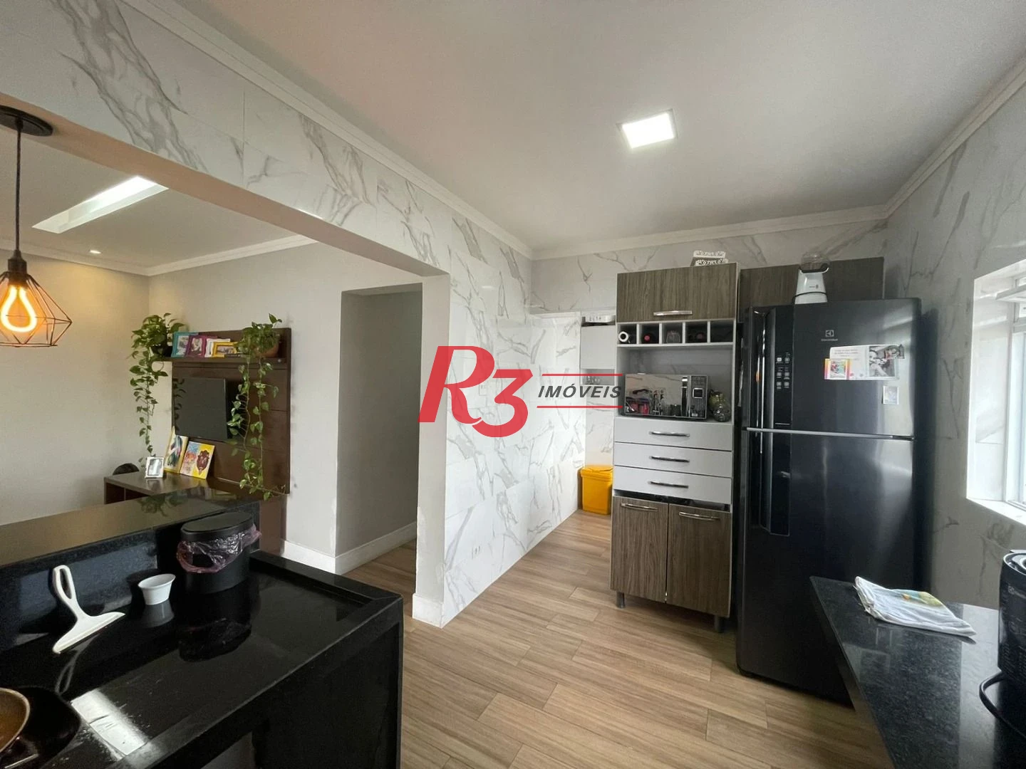 Casa com 3 dormitórios à venda, 117 m² por R$ 950.000,00 - Estuário - Santos/SP