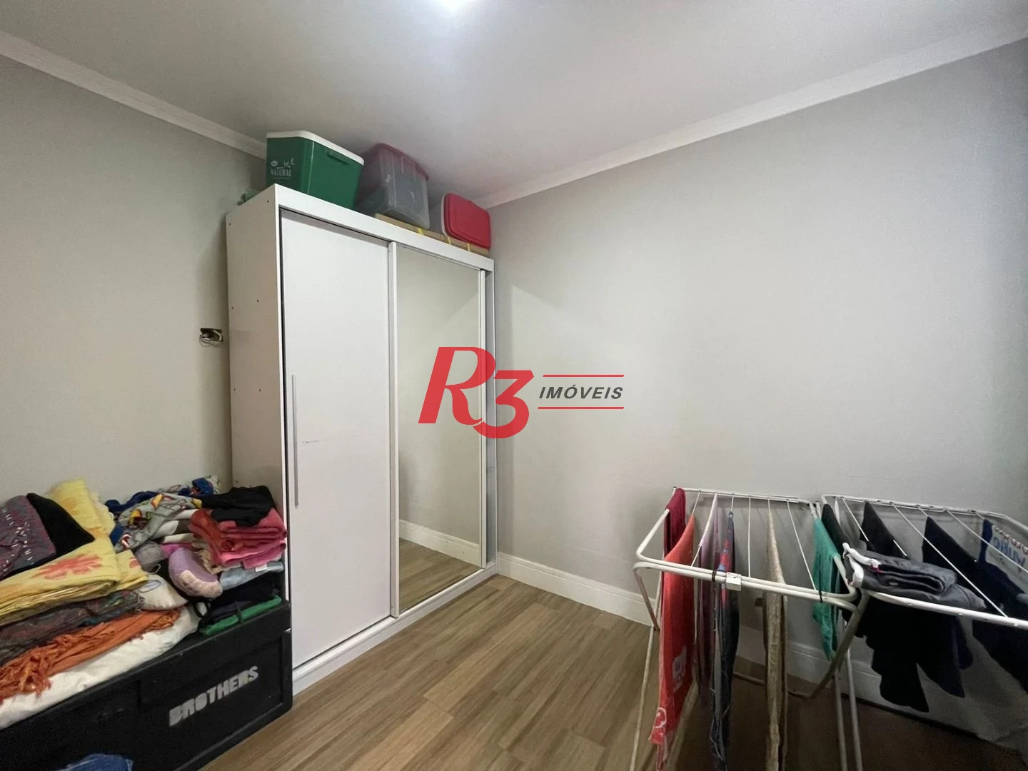 Casa com 3 dormitórios à venda, 117 m² por R$ 950.000,00 - Estuário - Santos/SP