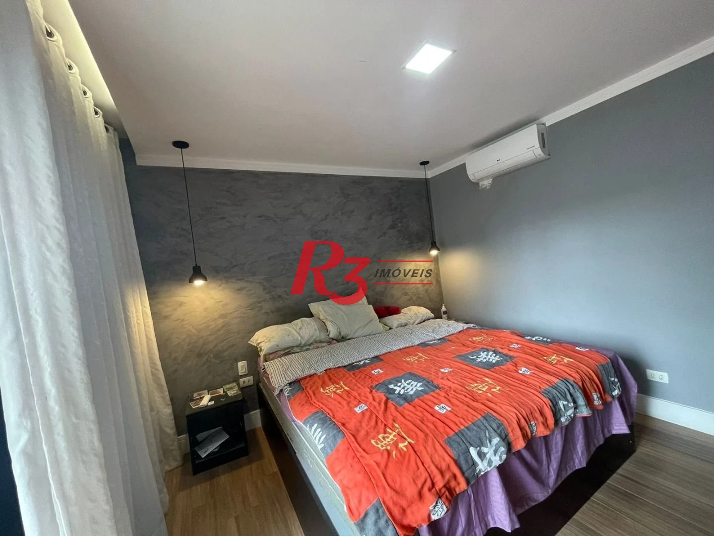 Casa com 3 dormitórios à venda, 117 m² por R$ 950.000,00 - Estuário - Santos/SP
