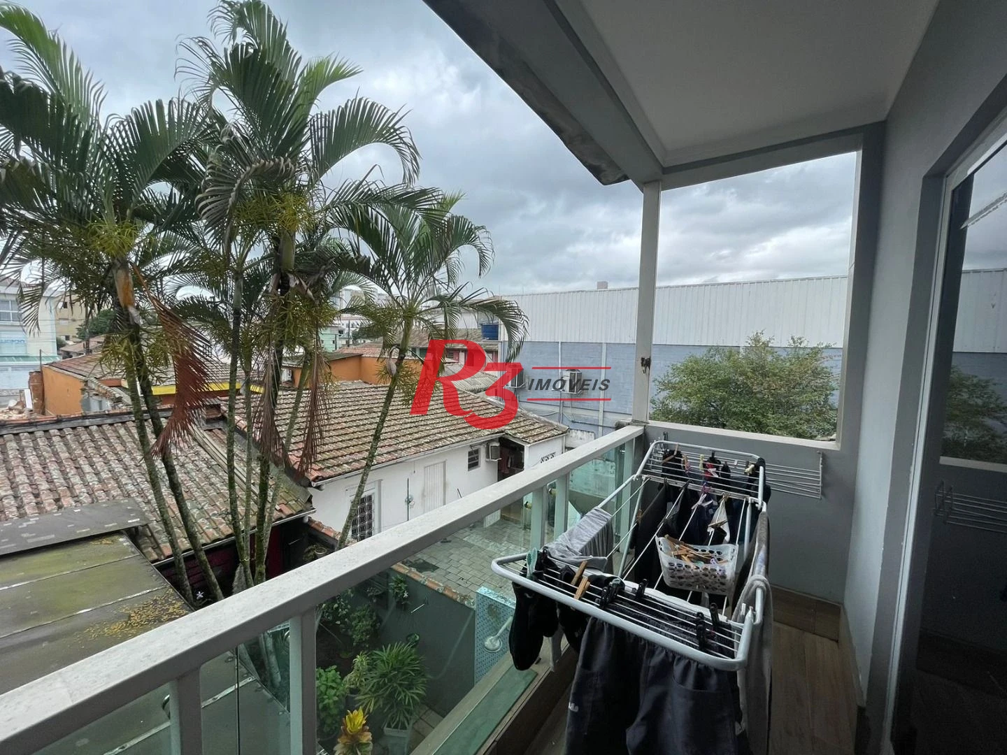 Casa com 3 dormitórios à venda, 117 m² por R$ 950.000,00 - Estuário - Santos/SP