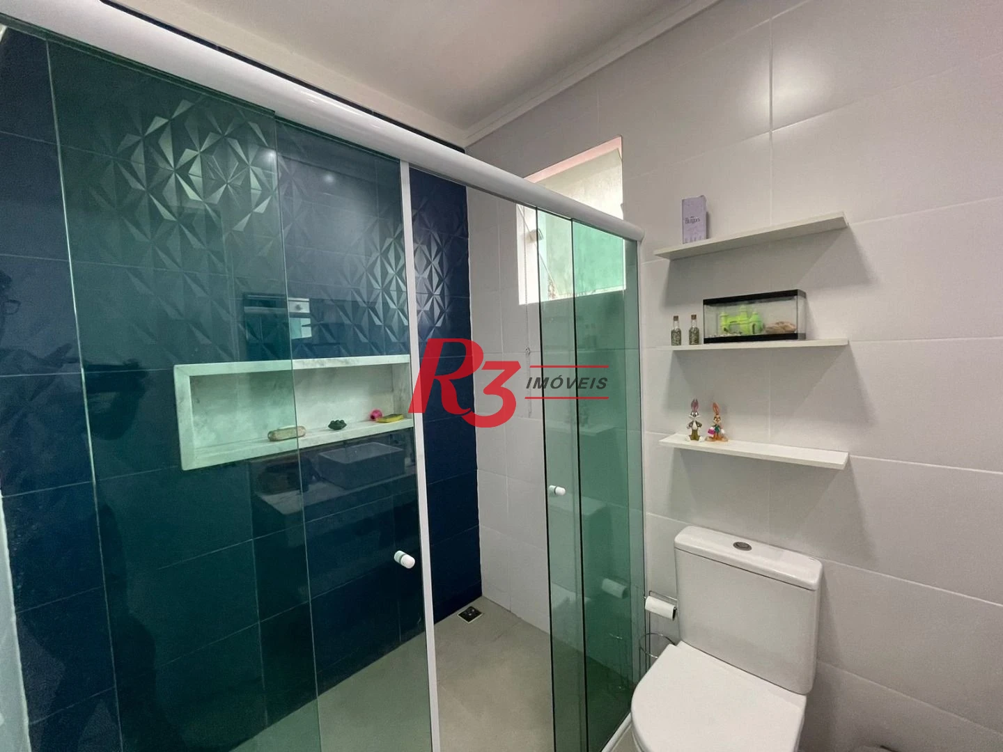 Casa com 3 dormitórios à venda, 117 m² por R$ 950.000,00 - Estuário - Santos/SP