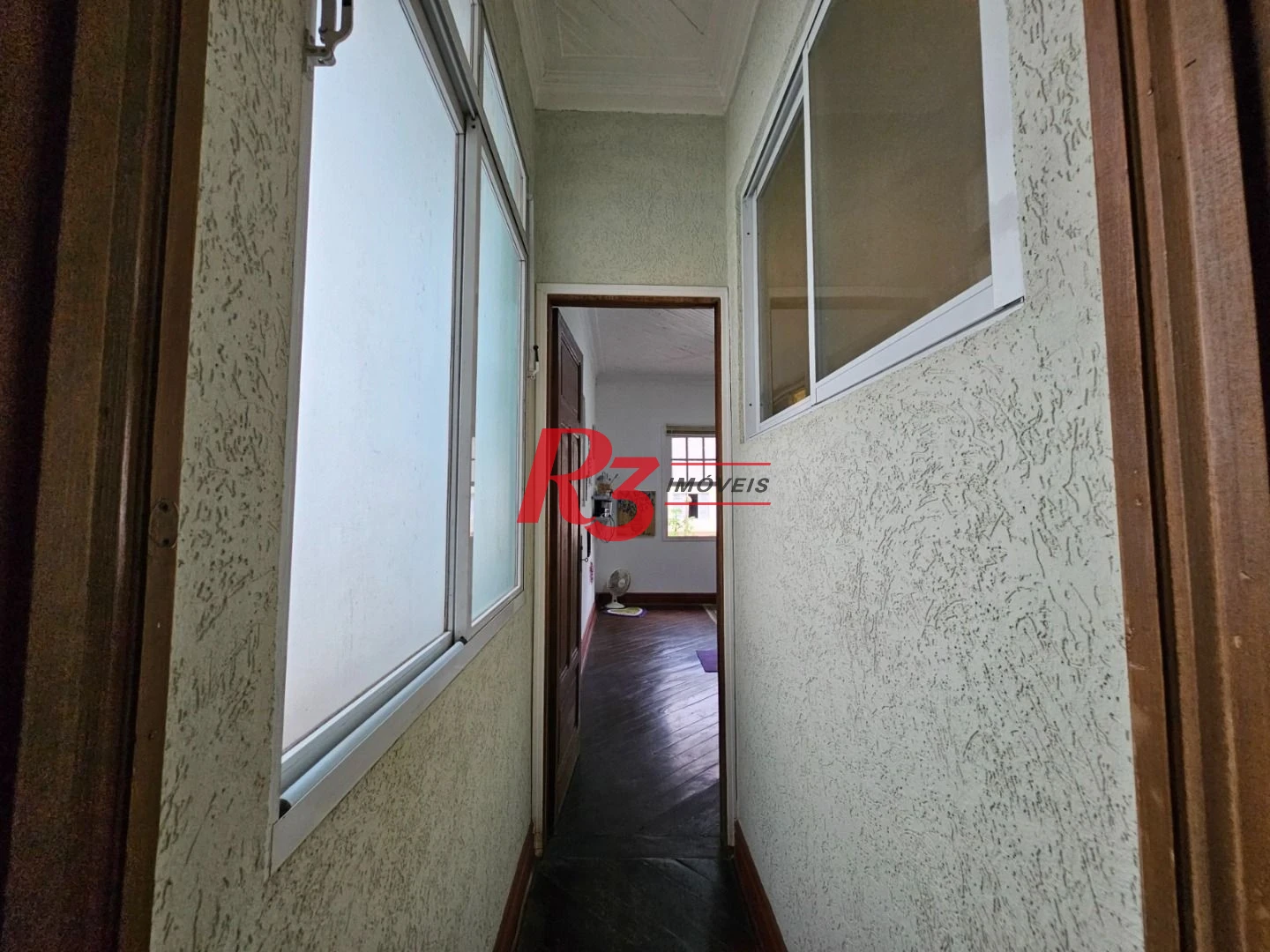 Casa com 3 dormitórios à venda, 154 m² por R$ 1.100.000,00 - Vila Belmiro - Santos/SP