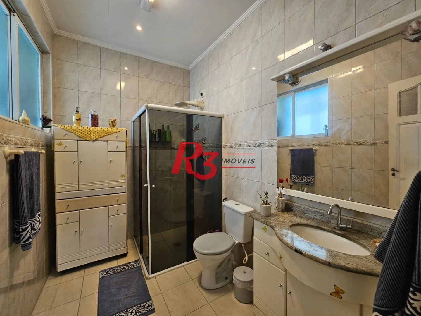 Casa com 3 dormitórios à venda, 154 m² por R$ 1.100.000,00 - Vila Belmiro - Santos/SP