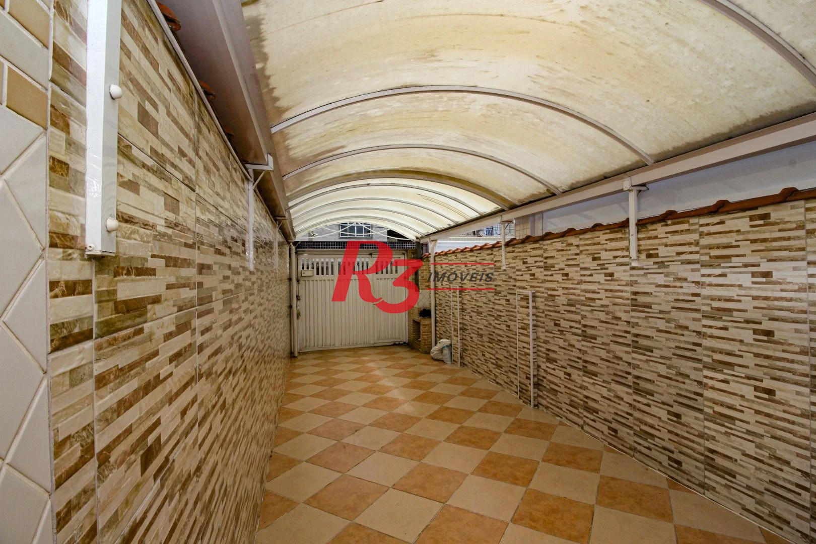 Sobrado com 3 dormitórios à venda, 136 m² por R$ 890.000,00 - Vila Valença - São Vicente/SP