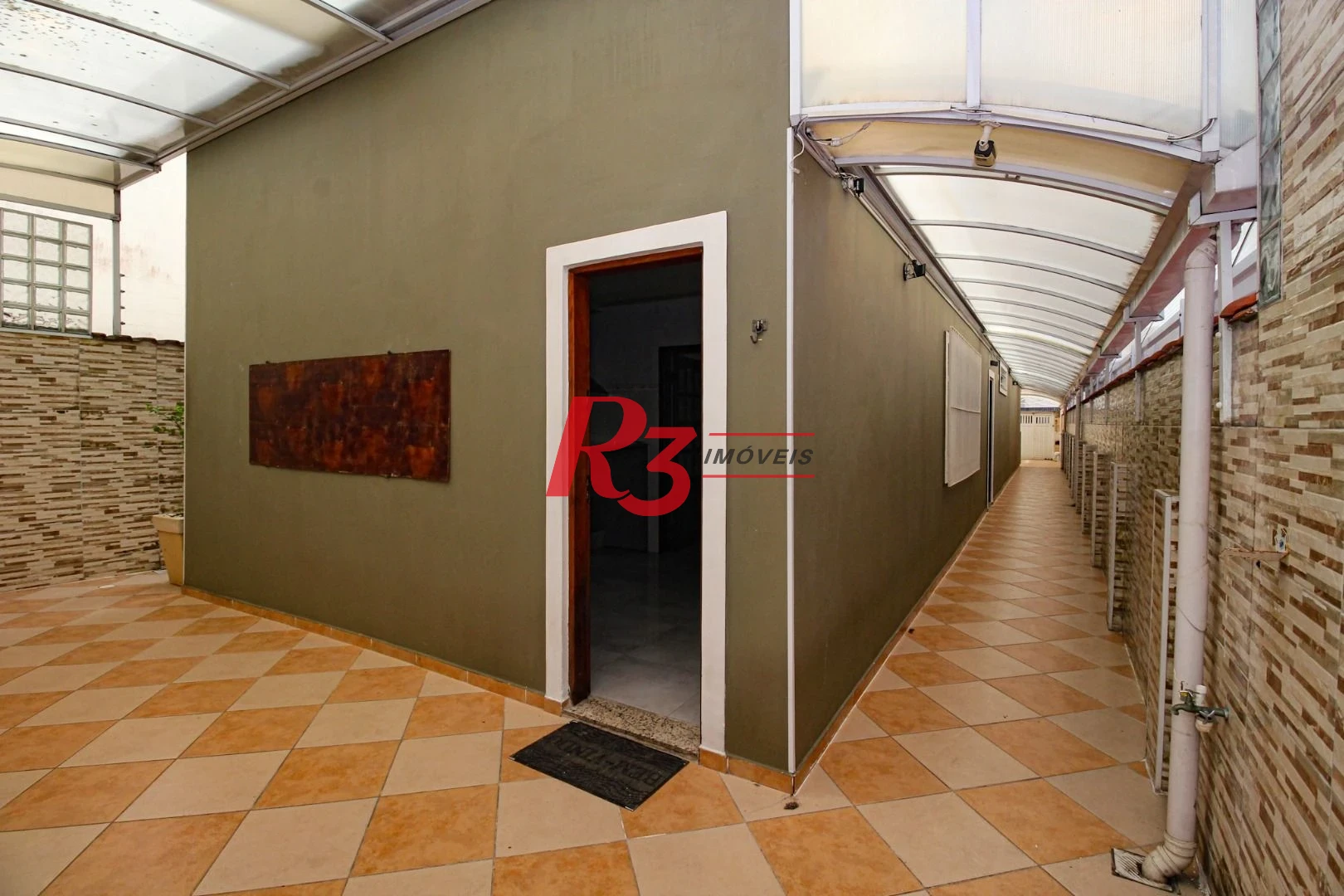 Sobrado com 3 dormitórios à venda, 136 m² por R$ 890.000,00 - Vila Valença - São Vicente/SP