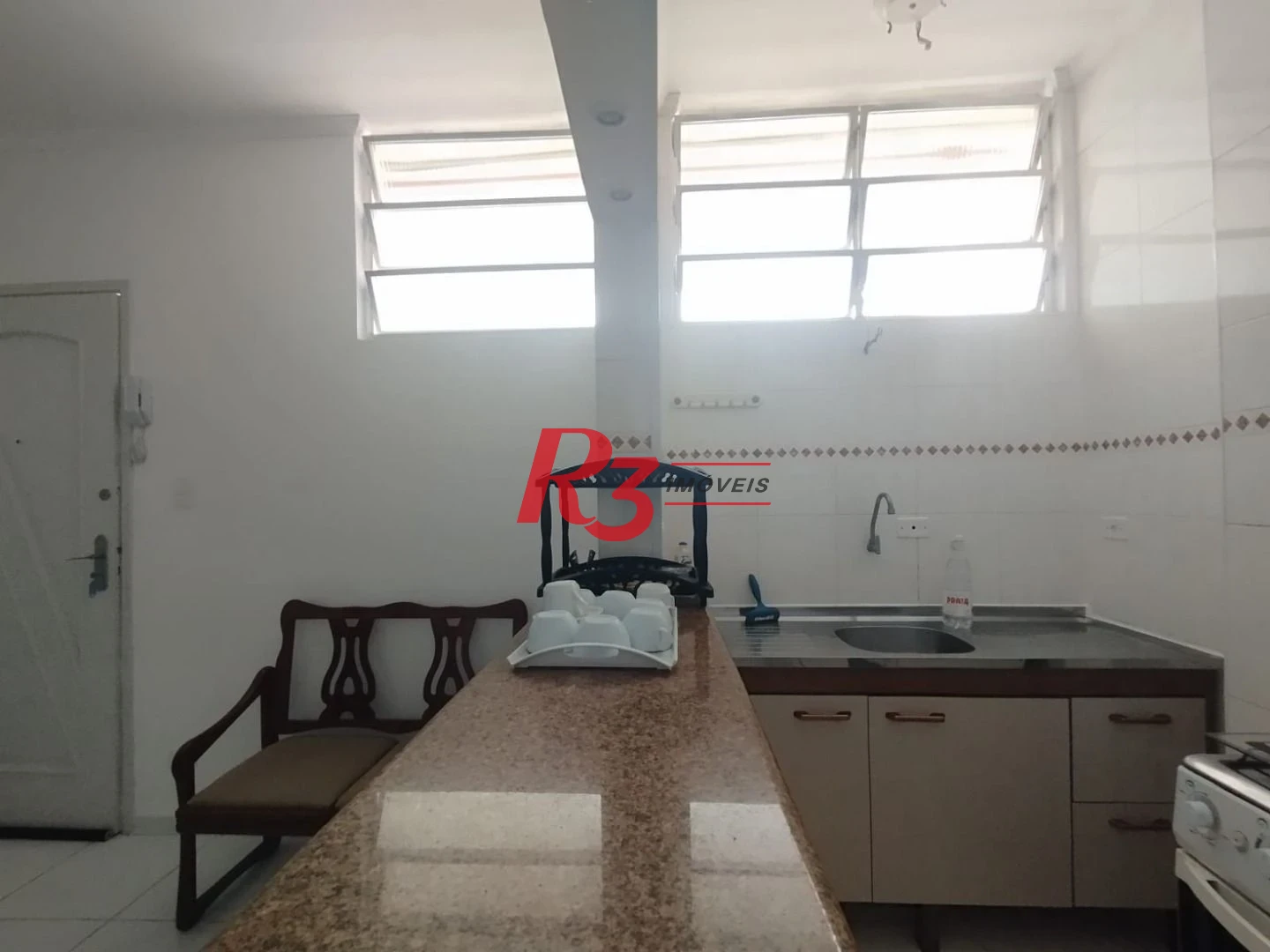 Apartamento com 2 dormitórios à venda, 55 m² por R$ 351.000,00 - Gonzaga - Santos/SP