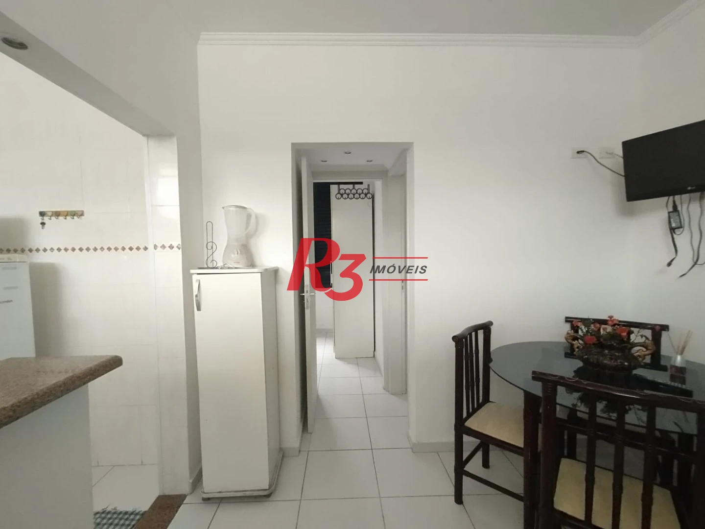 Apartamento com 2 dormitórios à venda, 55 m² por R$ 351.000,00 - Gonzaga - Santos/SP