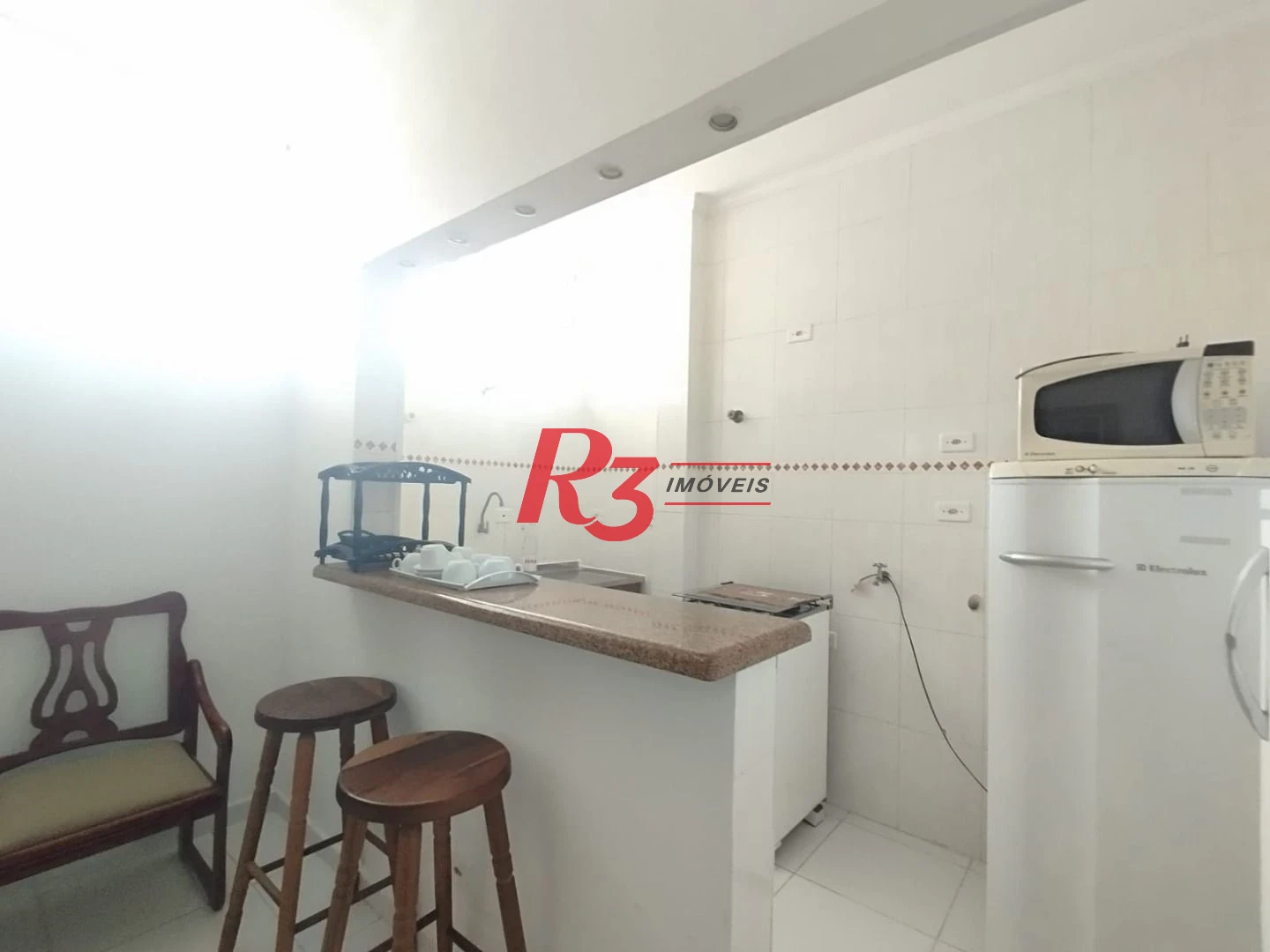 Apartamento com 2 dormitórios à venda, 55 m² por R$ 351.000,00 - Gonzaga - Santos/SP