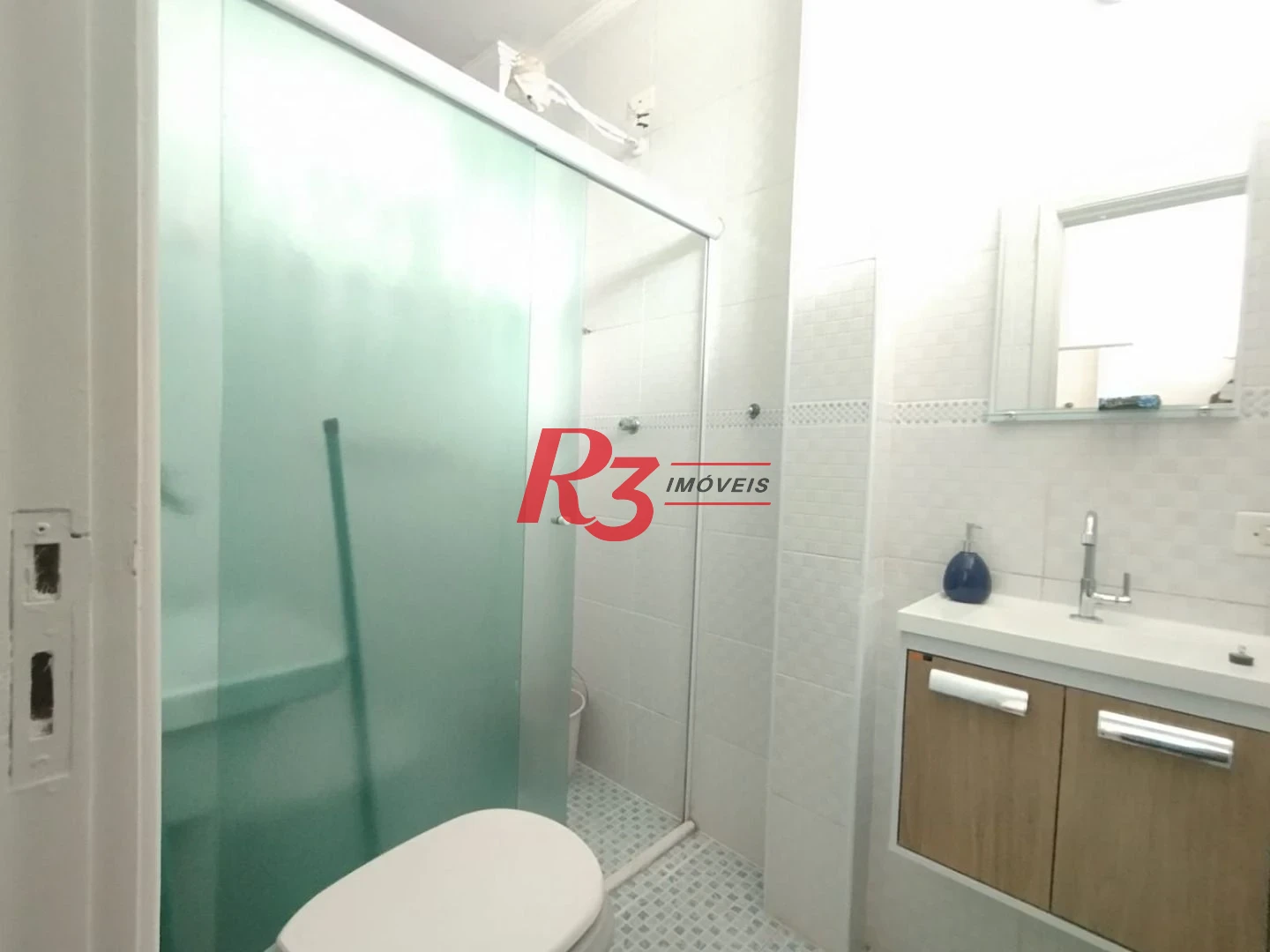 Apartamento com 2 dormitórios à venda, 55 m² por R$ 351.000,00 - Gonzaga - Santos/SP