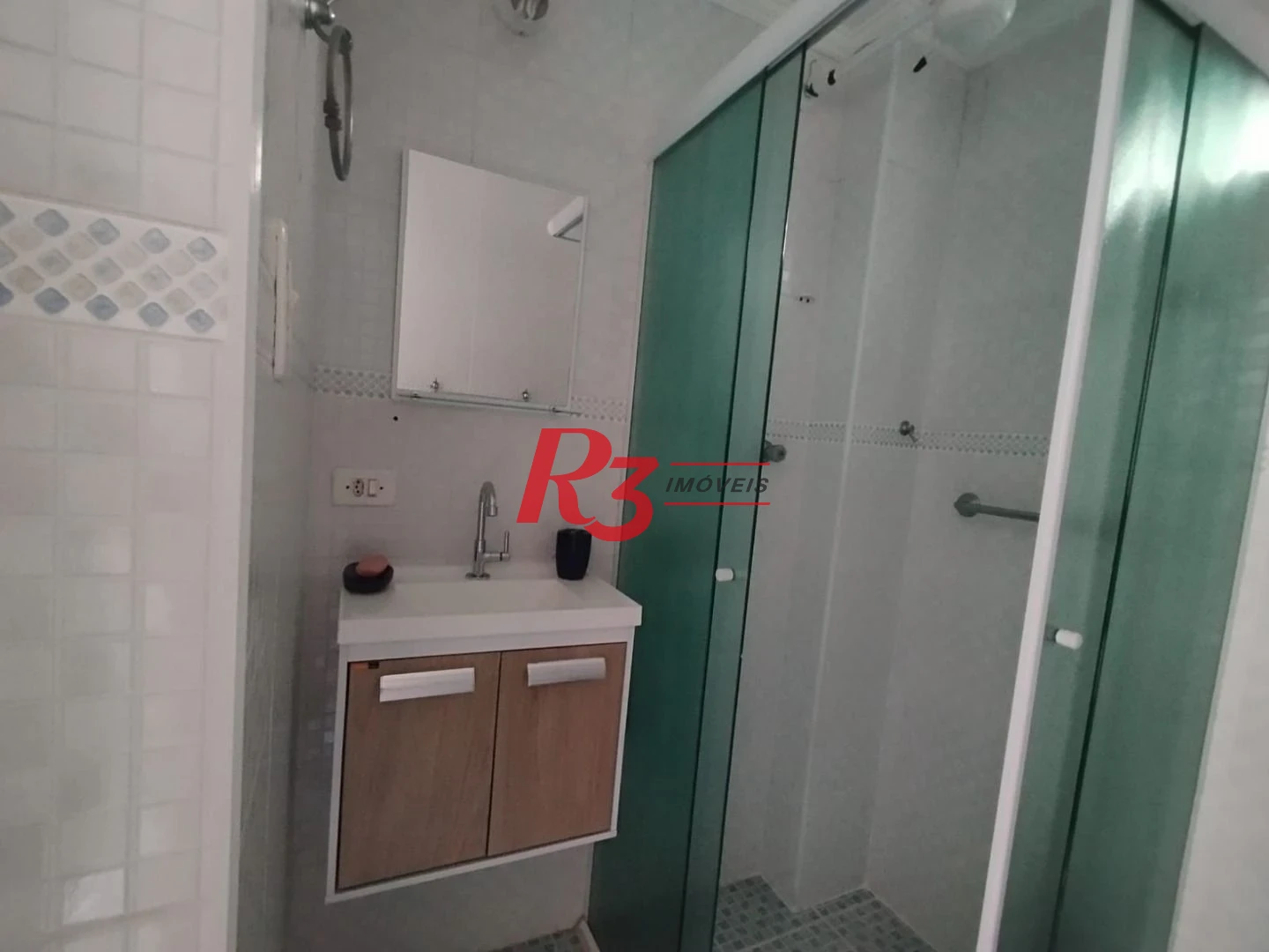 Apartamento com 2 dormitórios à venda, 55 m² por R$ 351.000,00 - Gonzaga - Santos/SP