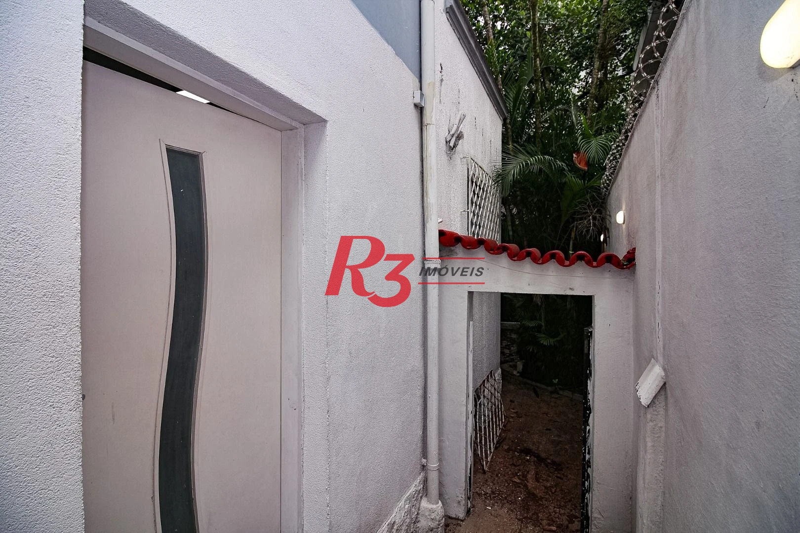 Sobrado, 300 m² - venda por R$ 2.700.000,00 ou aluguel por R$ 16.700,00/mês - Gonzaga - Santos/SP
