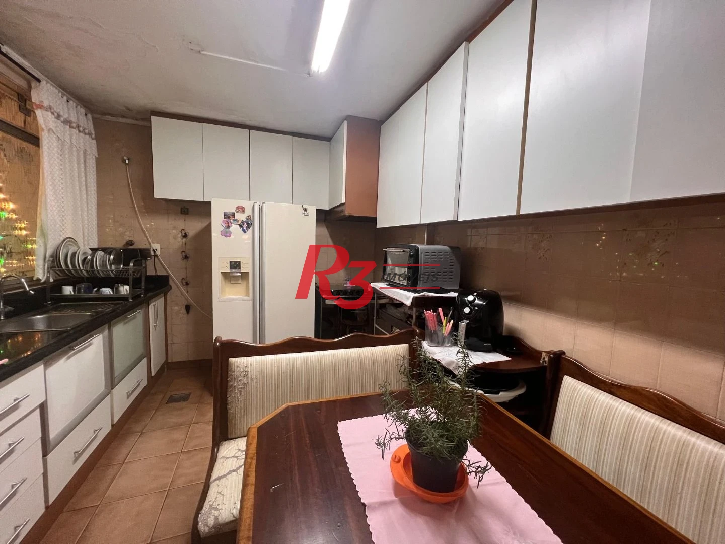 Casa com 3 dormitórios à venda, 148 m² por R$ 1.100.000,00 - Embaré - Santos/SP