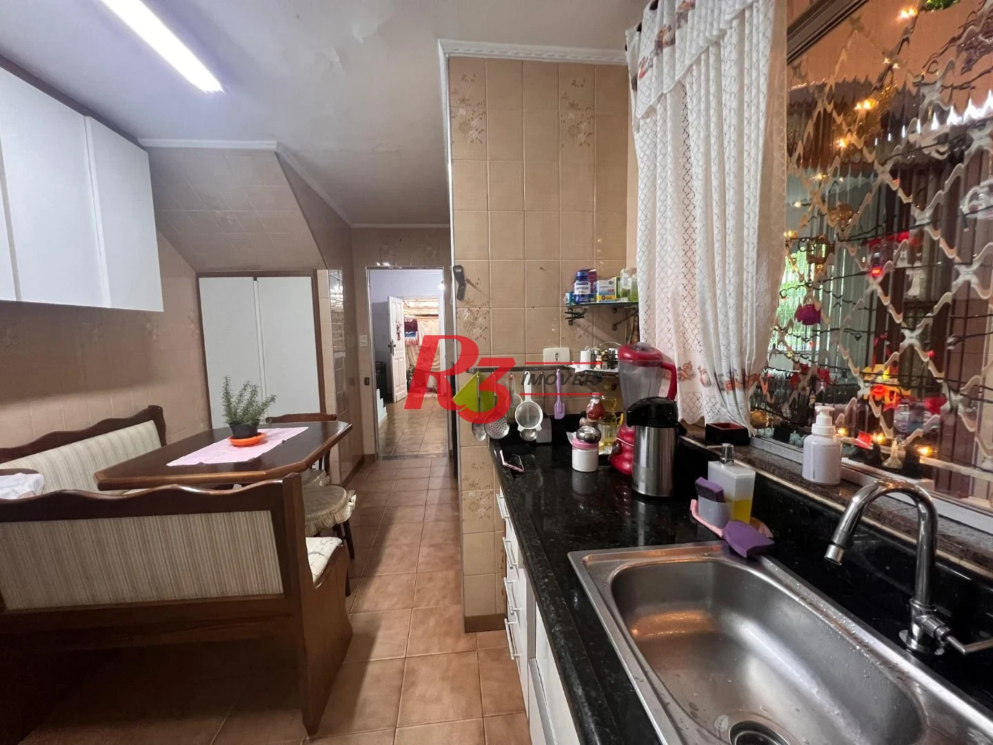 Casa com 3 dormitórios à venda, 148 m² por R$ 1.100.000,00 - Embaré - Santos/SP
