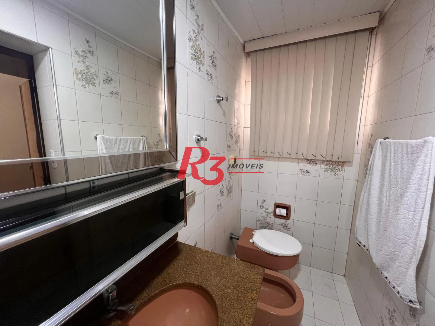 Casa com 3 dormitórios à venda, 148 m² por R$ 1.100.000,00 - Embaré - Santos/SP