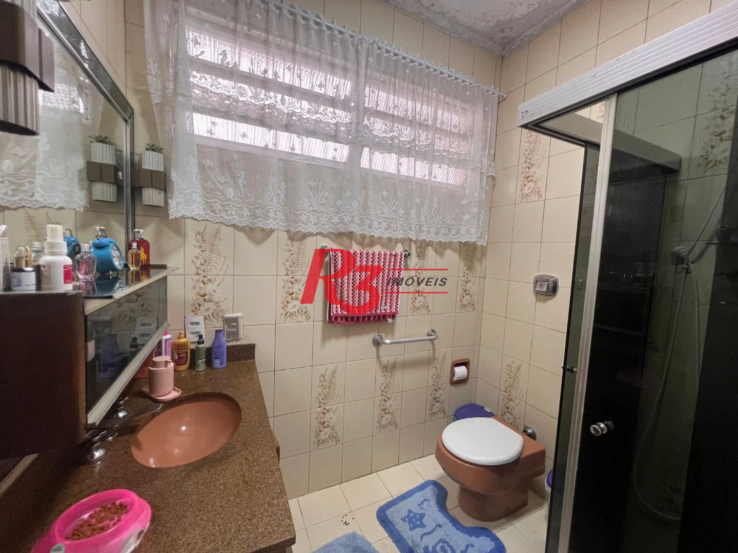 Casa com 3 dormitórios à venda, 148 m² por R$ 1.100.000,00 - Embaré - Santos/SP