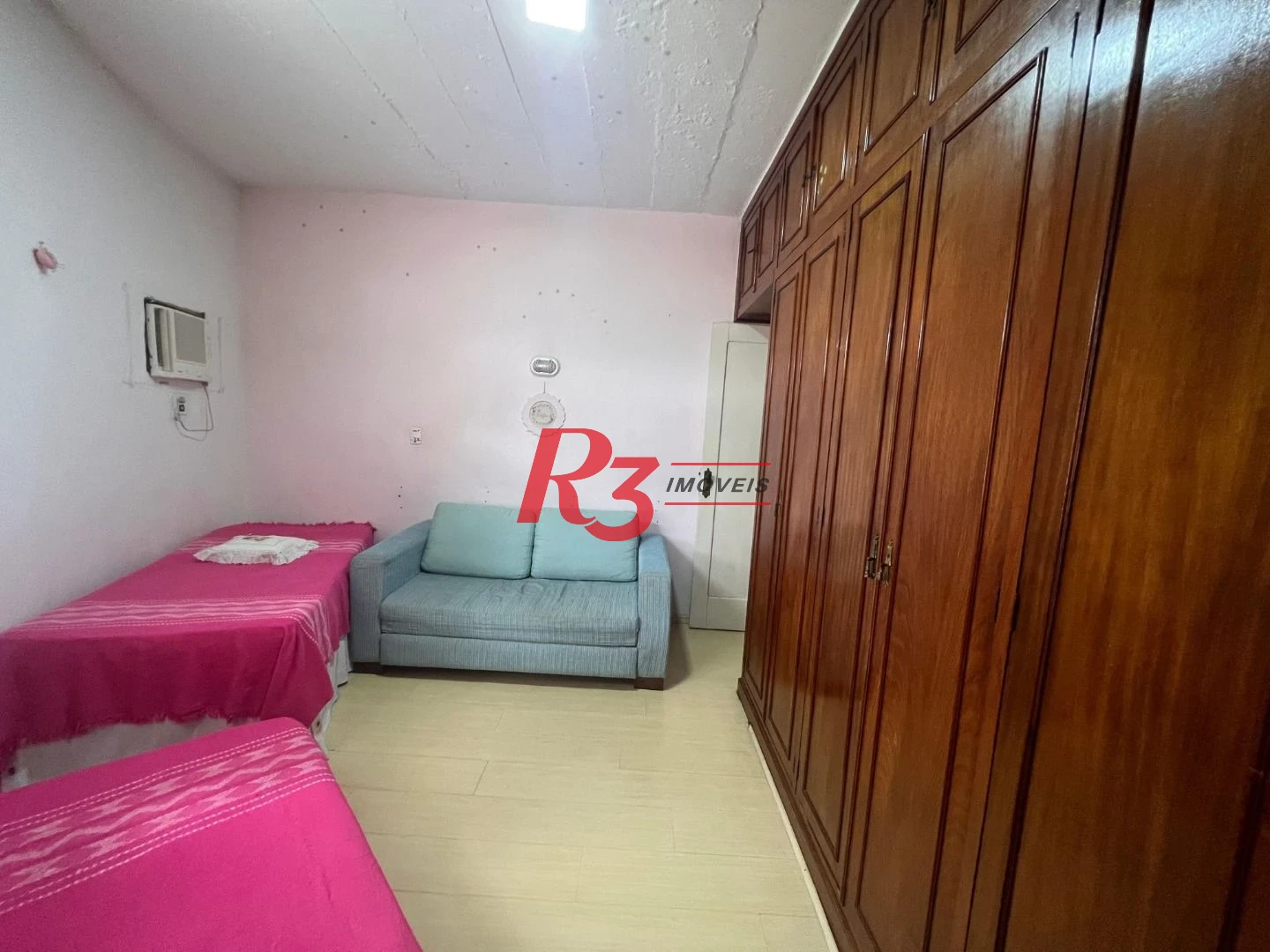 Casa com 3 dormitórios à venda, 148 m² por R$ 1.100.000,00 - Embaré - Santos/SP