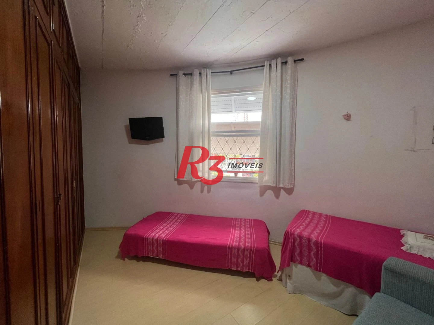 Casa com 3 dormitórios à venda, 148 m² por R$ 1.100.000,00 - Embaré - Santos/SP