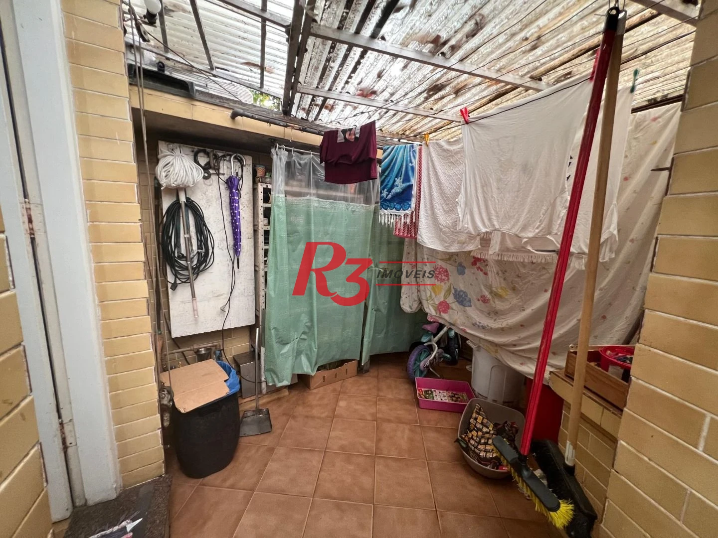Casa com 3 dormitórios à venda, 148 m² por R$ 1.100.000,00 - Embaré - Santos/SP
