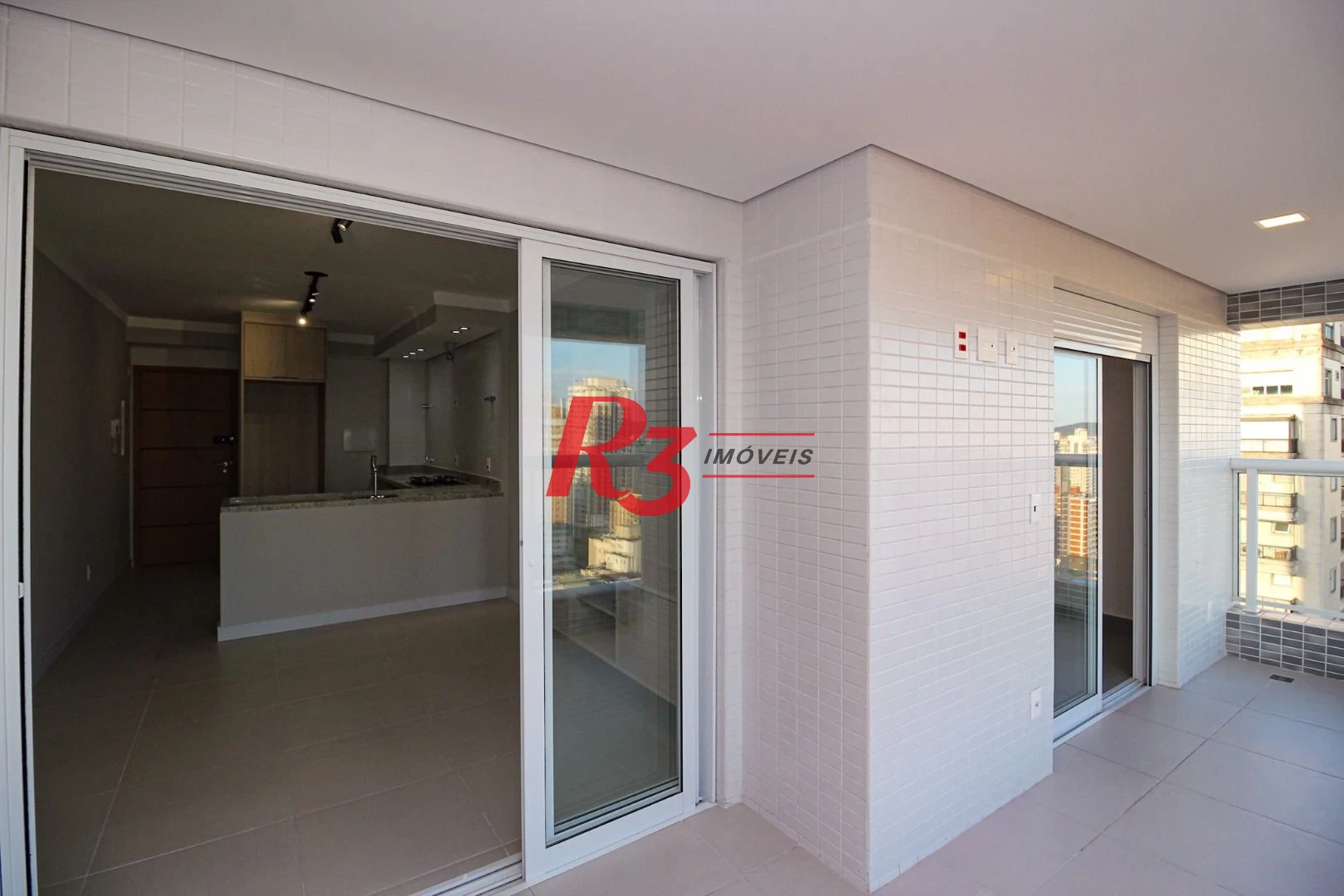Apartamento com 2 dormitórios para alugar, 65 m² por R$ 6.900,00/mês - Vila Rica - Santos/SP